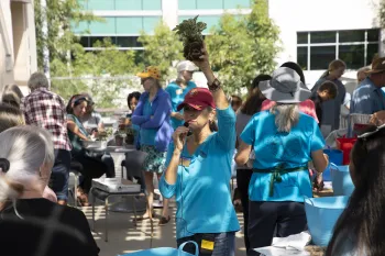 Master Gardener giving a demonstration at the 40th Anniversary Fall Festival