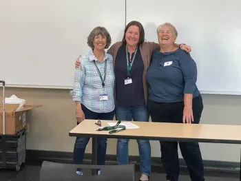 Kathy, Nicole and Colleen. Nicole receiving her buzy bee pin. She volunteered in excess of 100 hours during her first year as a MFP.