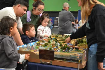 families look at watershed table
