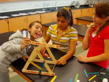 kids building a catapult