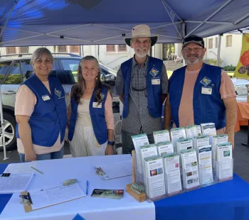 UC Master Gardeners at a Farmers Market.