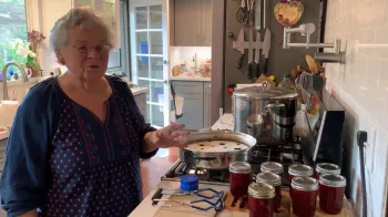 Linda making strawberry jam