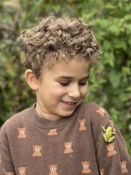 Child with a frog