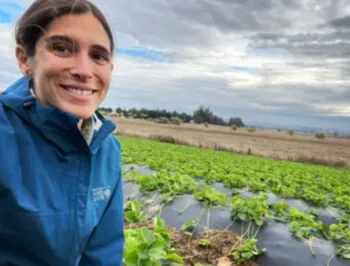 Ellie Andrews in a field