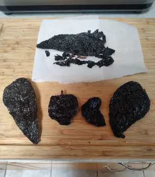 three groups of dried adobo peppers look alike