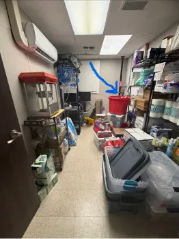 A storeroom with an arrow indicating a rodent entry point 