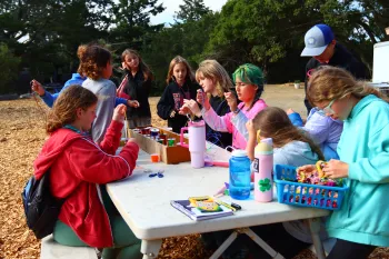 Day camp members are making crafts 