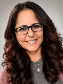 Headshot of a person smiling