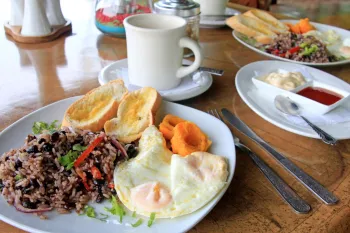 photo of recipe Gallo Pinto with eggs and other food on the plate.