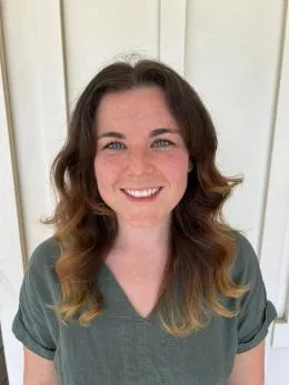 A headshot of Kristen Becker smiling