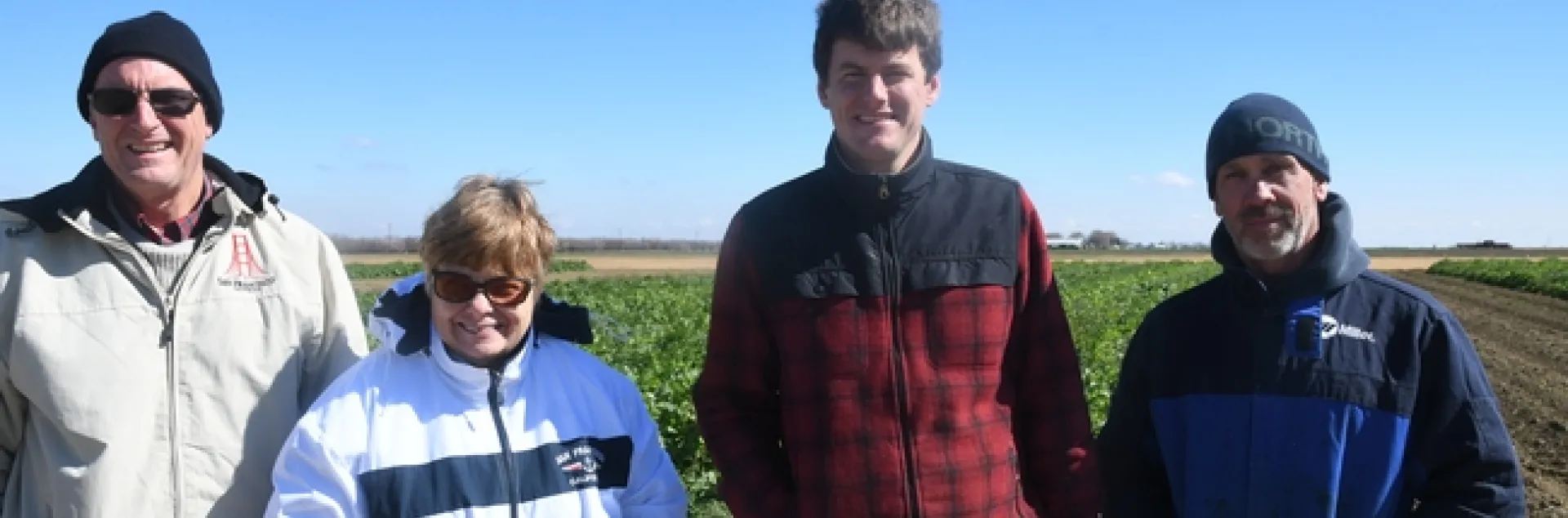 Marc Luff (second from right) and Ky Cooper (right) of Paicines Ranch along with Luff’s parents visiting the NRI Project field in Five Points, CA, February 22, 2019
