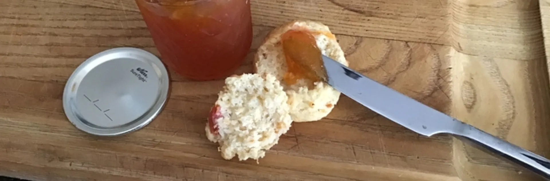 Fresh apricot scone with apricot jam