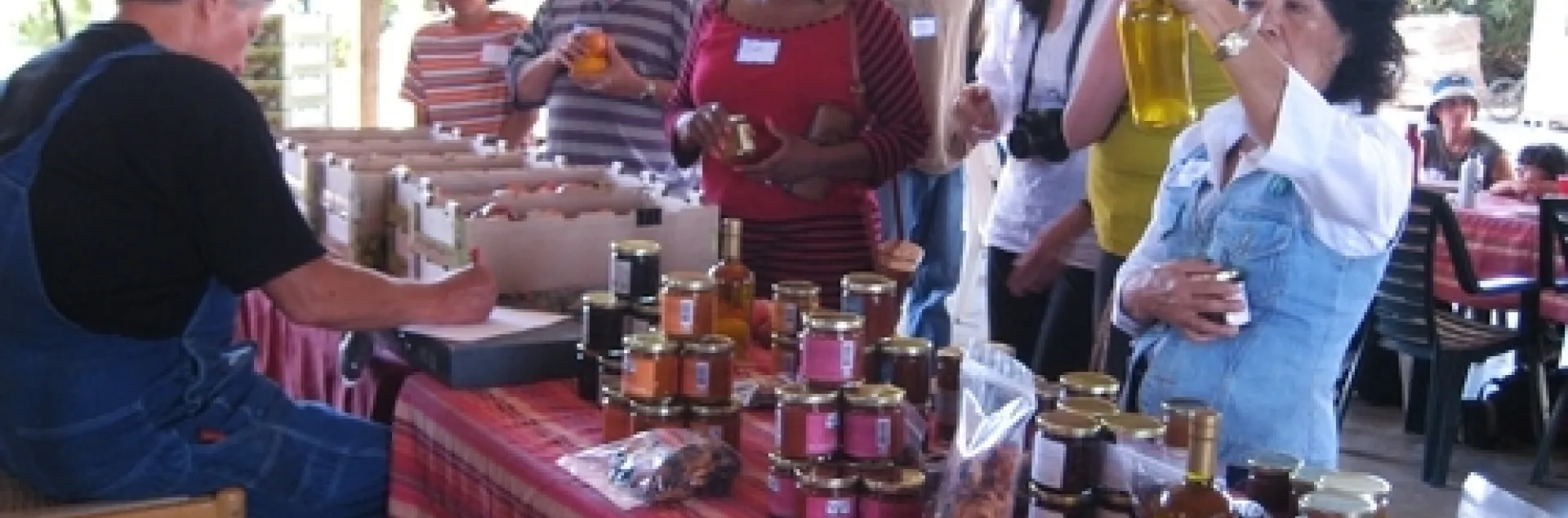 Pre-pandemic, Farmer Al sells products to visitors at Frog Hollow Farms. Agritourism operations have faced drastic business disruptions.