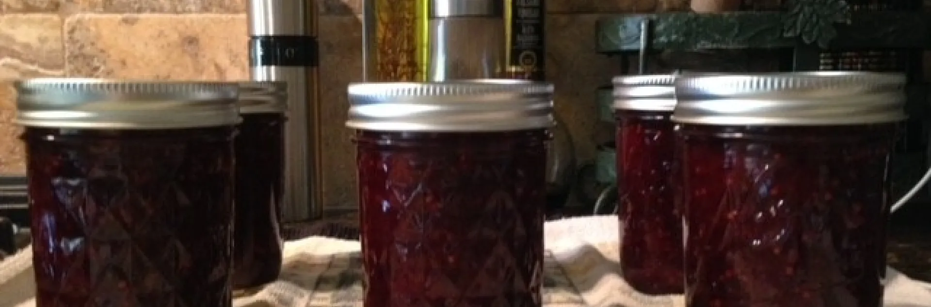 Finished plum sauce cooling on a towel