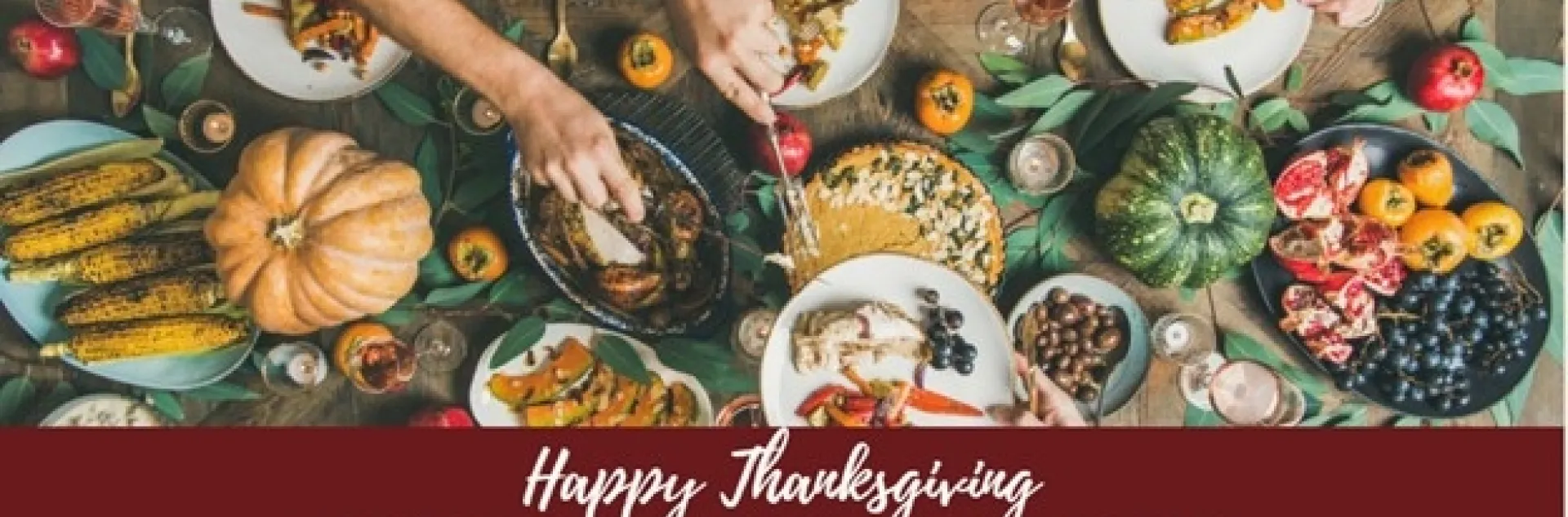 Looking down at a table set with food. Hands are reaching in with utensils to put turkey and sweet potatoes on plates. Banner reads Happy Thanksgiving from the SLO and SB County Master Food Preservers