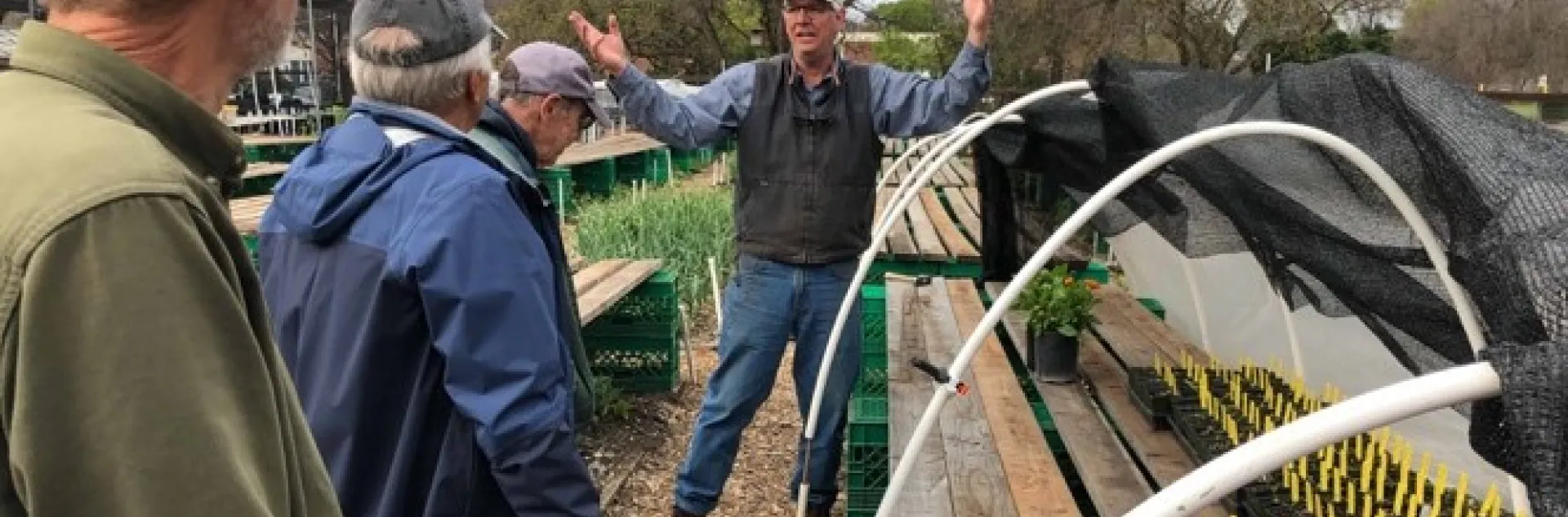 UC Master Gardeners prepare hoop houses for the GTPS seedlings. Photo by Fred Teensma.
