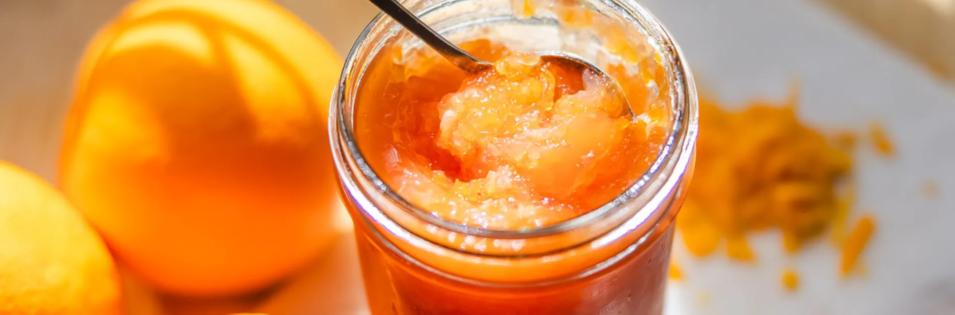 oranges and jar of orange marmalade