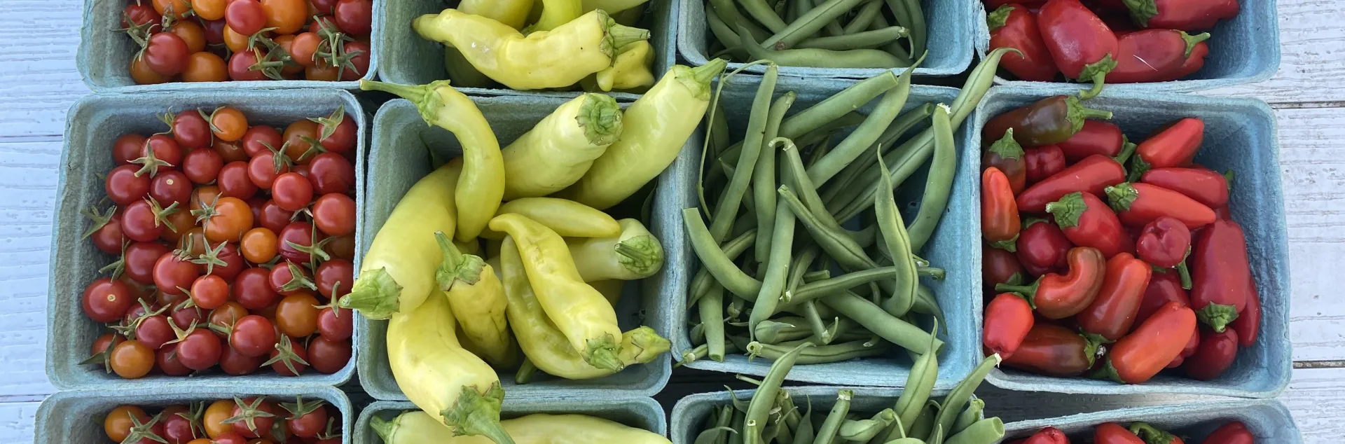 assorted vegetables in produce baskets