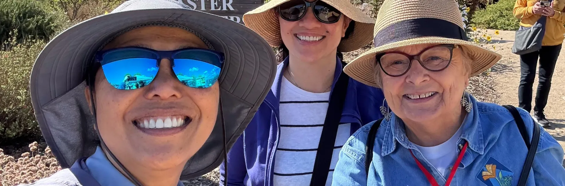 A Master Gardener with garden fair visitors