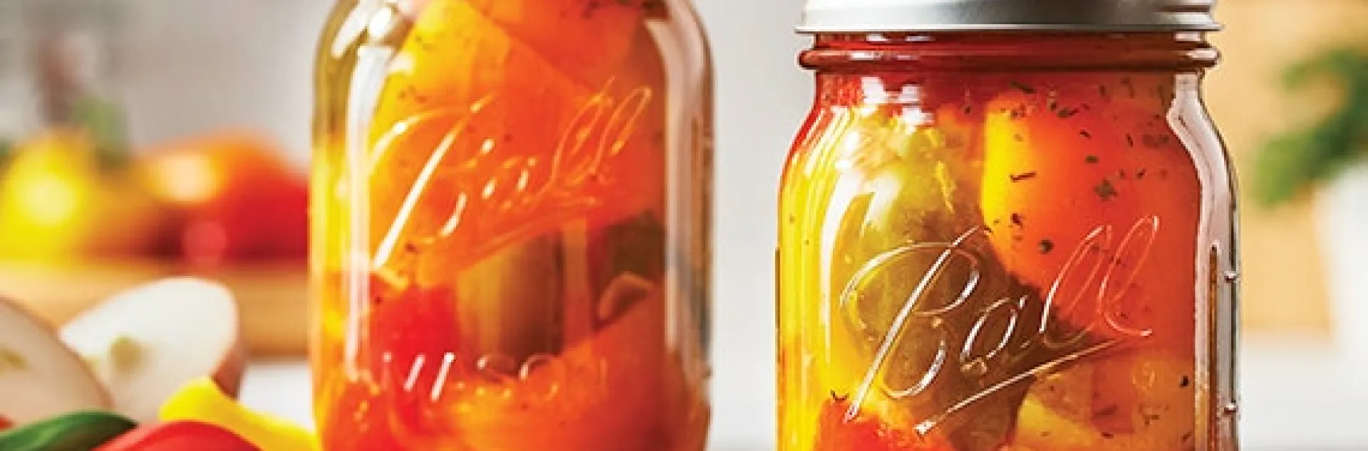 mixed hot peppers in jars