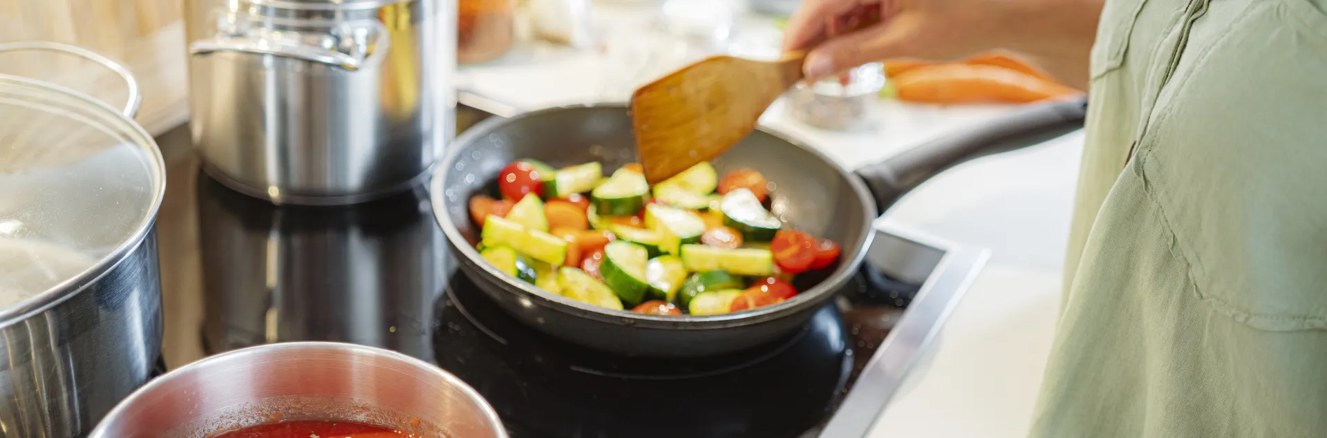 Tomato sauce and grilled zuccini on stove