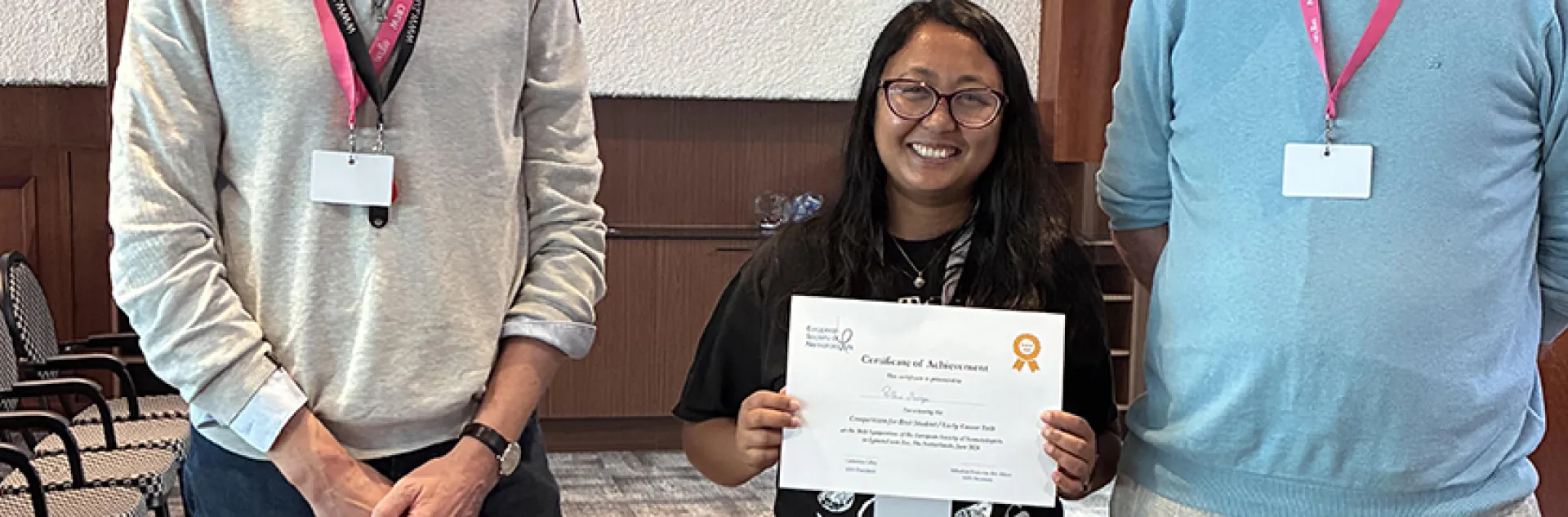 Pallavi Shakya holding award: first-place winner of “Best Student/Early Career Talk” at the 36th Symposium of the European Society of Nematologists