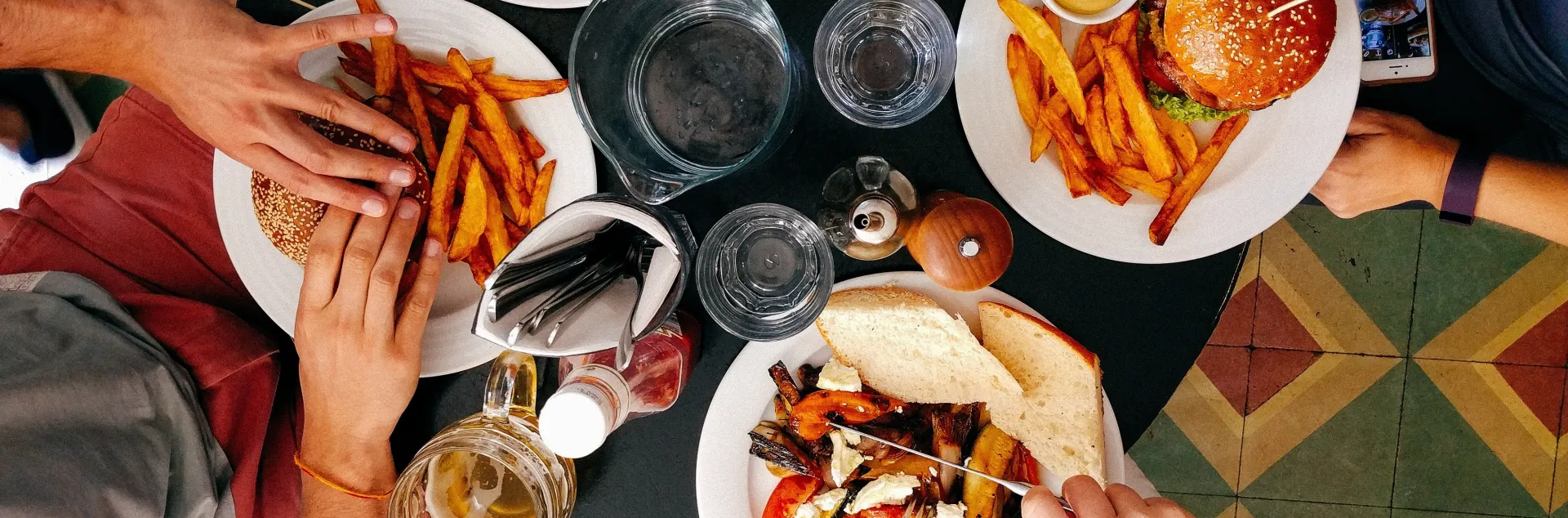 aerial view of people sharing a meal at a table
