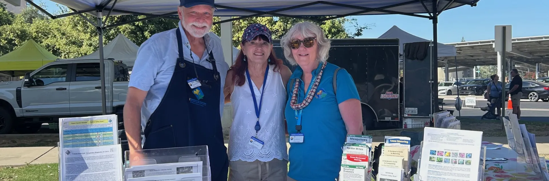 Master Gardeners in their Kiosk at the Visalia Farmers Market