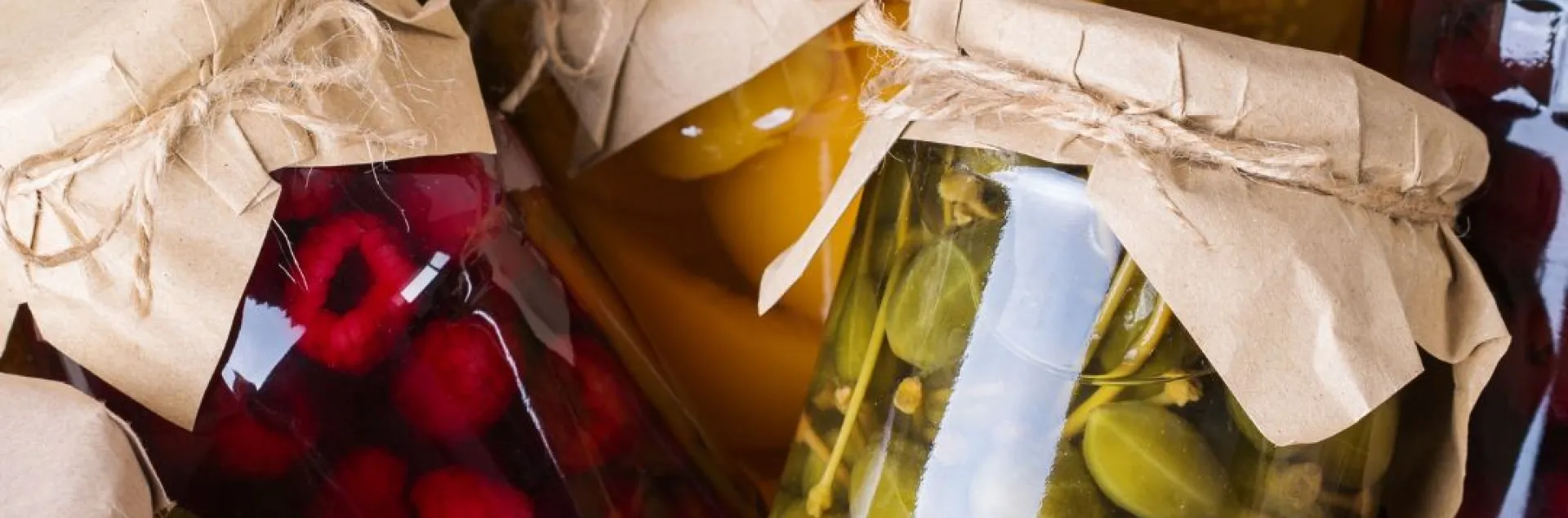 jars of various preserved fruits and vegetables