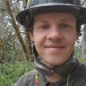 A headshot of Henri Holbrook.