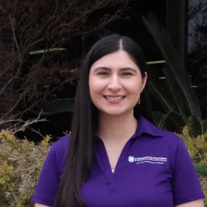 Portrait of a 4-H Community Education Specialist wearing UC ANR Cooperative Extension attire.