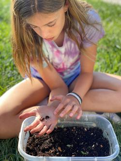 Girl Scout, Amelia shares worm composting bin