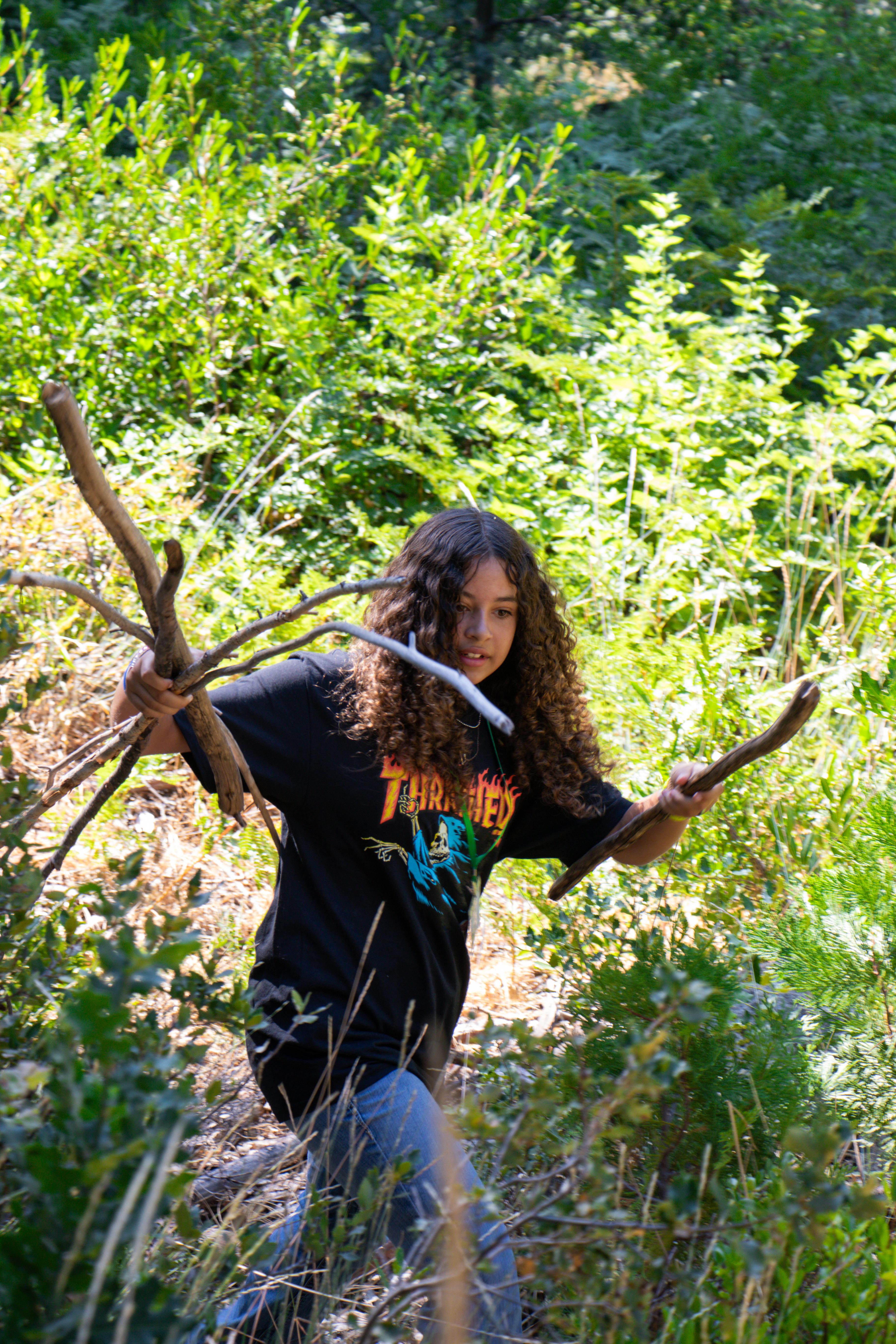 Finding sticks to build the perfect SOS shelter