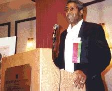 Desmond Jolly delivers the dinner keynote presentation at the Second National Small Farm Conference in St. Louis, Missouri, October 1999.